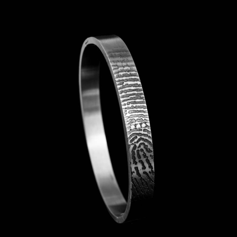 Bracelet avec charnière et 3 zircons sertis en acier inoxydable