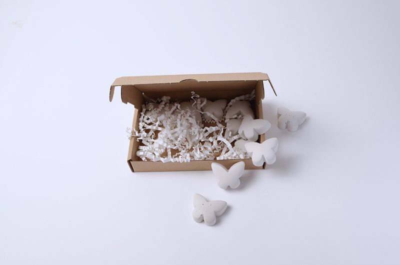 Boîte de confort pierre commémorative petite - Papillon | blanc | Mélange de 12 pièces